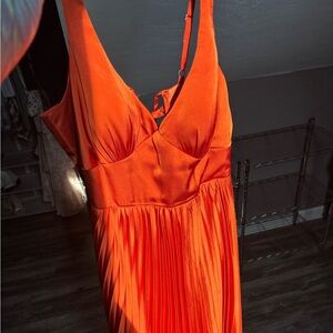 Corset back,burnt orange, length hits just a little above the ankles.